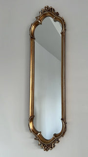 Vintage ornate handcarved oval mirror