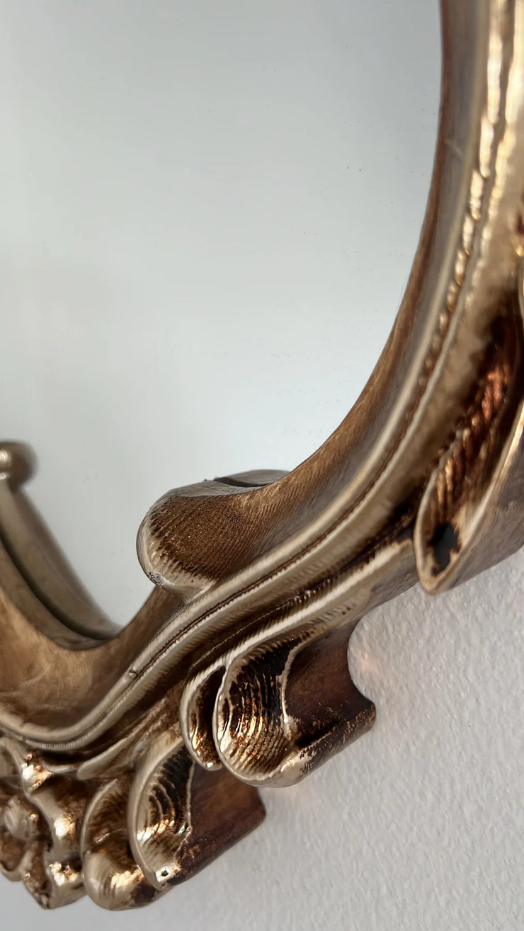 Vintage ornate handcarved oval mirror