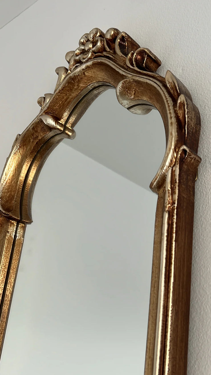 Vintage ornate handcarved oval mirror